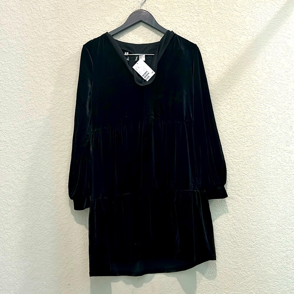 Divided black dress top size s